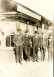 Postcard of men in front of Seymour's first depot